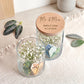 Vorratsglas Hochzeit Geschenk als liebevolle Aufmerksamkeit für Braut und Bräutigam. Dieses personalisierte Glas kann mit Süßigkeiten, Trockenblumen oder Geldgeschenken individuell befüllt werden.