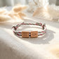 Personalisierter Kinderschmuck aus Holz mit Namensgravur, verstellbares Kinderarmband als Geschenk zur Taufe, Kommunion oder Einschulung, einzigartig durch natürliche Maserung und individuelle Gravur